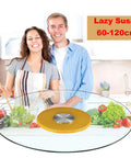 Couple using Tempered Glass Swivel Turntable 360 Degree Rotating Serving Tray With Large Base Lazy Susan, Gold Base in kitchen
