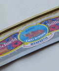 Close-up of label on Hand Forged In Austria Scythe Blade With Curved Edge For Easy Harvest, 30 Inch Blade, Pro Grade Austrian Steel