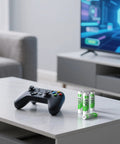 Gaming controller next to All In One Rechargeable AA And AAA Batteries Kit With 8 Bay Smart Charger 2800mAh AA 1.2V NiMH And 1100mAh AAA 1.2V NiMH on table