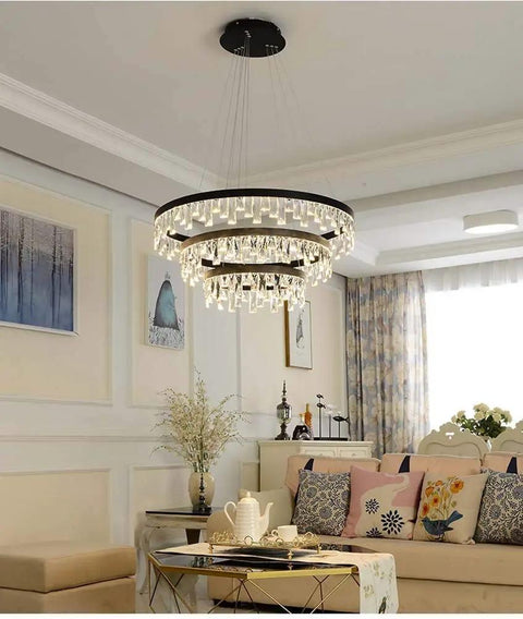 Modern Crystal Chandelier Featuring Slick Aluminum Build and Dazzling LED Glow illuminating a stylish living room.