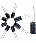 Close-up of capacitors from Dope 810-Piece Electrolytic Capacitor Kit With 42 Values 10V To 100V, includes 2200uF 25V capacitor.