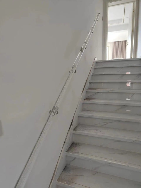 Heavy Duty Clear Acrylic Railing System For Decks Patios And Balconies Weather Resistant Panels mounted on a staircase.