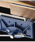 Rapid Action 9 Inch Woodworking Vise With Thirteen And A Half Inch Jaw Opening and toe-in jaws on workbench