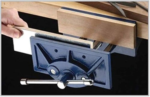 Rapid Action 9 Inch Woodworking Vise With Thirteen And A Half Inch Jaw Opening and toe-in jaws on workbench