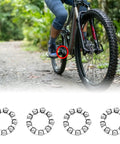 Cyclist on trail with Four Pack Bicycle Crank Ball Bearing Set One Quarter Inch With Nine Steel Balls for bike repair shown below