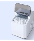 High Performance Countertop Ice Maker Portable With Built In Storage Bin For Rapid Ice Cubes Kitchen showing ice cubes inside.