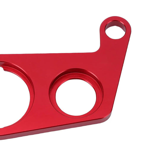 Close-up of red aluminum key switch and indicator light mount for 450R ATV, "Upgrade Your Rig With This Dope Key Switch And Indicator Light Mount For 450R ATV Made From Stylish Red Aluminum Ensuring A Tight Fit And Secure Attachment Without Compromise On Performance Or Style For Your Badass Off Road Machine"
