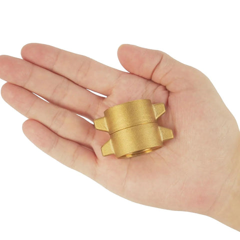 Hand holding Two Pack Garden Hose Female To Female Adapters With Dual Swivel Brass Three Quarter Inch GHT Connectors For Male Hoses, Heavy Duty Hose Couplers With Extra Washers, No Fuss Quick Connect, Built To Last.