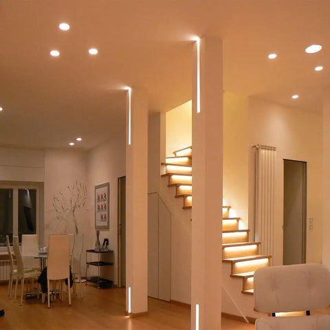 Modern living room with 12 Pack Slim 6 Inch LED Recessed Downlights, Ultra Thin 0.39 Inch Canless Fixture, damp rated installed.