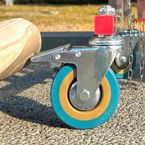 Close-up of hella smooth moving universal casters on Heavy Duty Adjustable Stainless Steel Retractable Safety Gate.