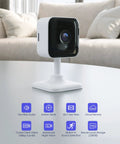 Indoor Security Cam and Baby Monitor 1080P HD WiFi Cam with Night Vision, on a table showcasing motion and sound alerts features.