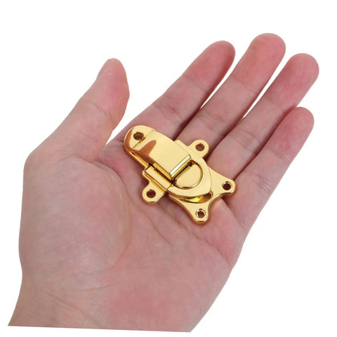 Stylish Vintage Zinc Alloy Duckbill Toggle Latch Set With All Mounting Hardware For Upgrading Wooden Jewelry Boxes And Cabinets In Super Cool Golden Finish You Will Love held in hand