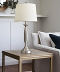 Three Way Dimmable Touch USB Table Lamp with silver finish and linen shade on a nightstand in living room