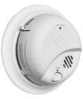 Hardwired AC Smoke Alarm With 10 Year Sealed Battery Backup And Smart Sensing Tech mounted on a white ceiling, showing detailed features.