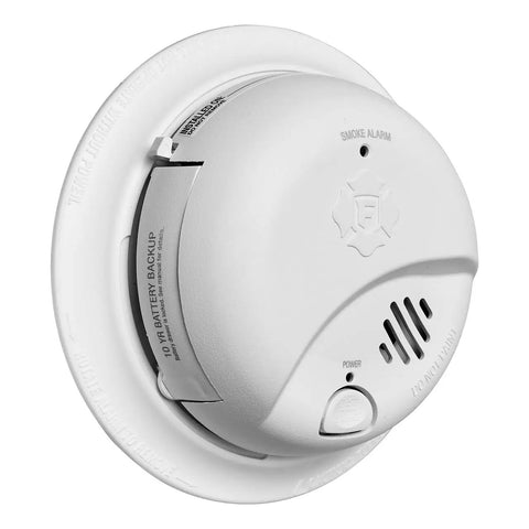 Hardwired AC Smoke Alarm With 10 Year Sealed Battery Backup And Smart Sensing Tech mounted on a white ceiling, showing detailed features.