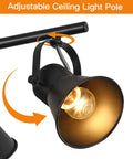 Close-up of adjustable head on plug-in four light track lighting fixture in industrial black with long 14.7 foot wire