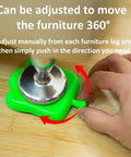 Hand using Heavy Duty Furniture Lifter Lever And Roller Wheels Sliders Kit With 660 lb Load Capacity on wood floor