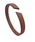 Side view of brown waterjet hydraulic piston bearing ring, model 05117940