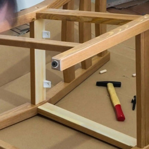 Table being assembled with 30 Pack Rubber Feet For Furniture And Tables Anti Skid Pads With Durable Rubber And Stainless Steel Bumpers Screw In Feet