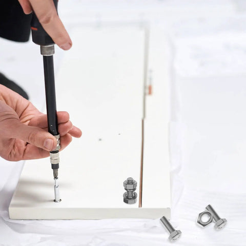 Person using 20 Piece M6 Stainless Steel Hex Bolts And Nuts Kit with 16mm thread length for mechanical fastening on white board.