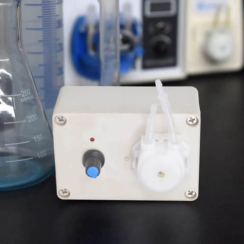 Front view of Peristaltic Liquid Dosing Pump For Lab And Aquarium Use 110 To 240 Volts, showing control knob and tubing connection.