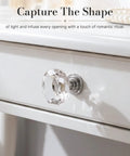 30 Pack Sparkling Clear Glass Cabinet Knobs 1 1/4 Inch Silver Polygon Drawer Pulls Kitchen Cupboard Hardware on white drawer.