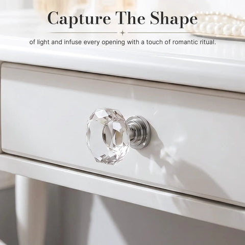 30 Pack Sparkling Clear Glass Cabinet Knobs 1 1/4 Inch Silver Polygon Drawer Pulls Kitchen Cupboard Hardware on white drawer.