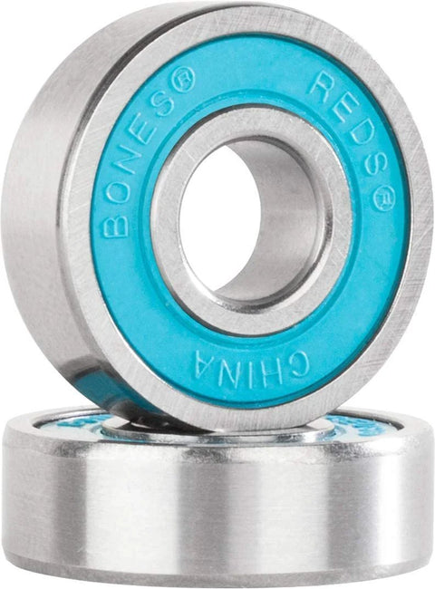 Two Bones Reds skateboard bearings with blue seals and silver metal housings