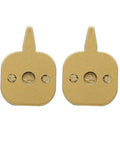 Premium Hydraulic Disc Brake Pads For Mountain And Road Bikes Featuring Gritty Resin Or Sintered Pads, gold color, compact design.