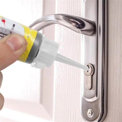 Applying 60ml Graphite Lock Lubricant Two Pack For Door Locks Keys Windows And Cars to a door latch for smooth operation.