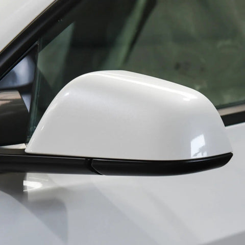 Fresh White Driver Side Mirror Lower Cover Replacement For Tesla Model 3 2017 To 2021 solid trim viewed from side angle.