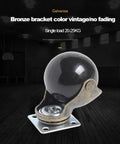 Rock Solid Vintage Brass Ball Caster Wheels With Secure Locking Brakes For Furniture Smooth As Silk Roll 2 Inch Heavy Duty Replacement Rollers Set Of Four For Couches Desks And Shelves, showing a vintage-style black caster with a bronze bracket.