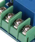 Close-up of No Sweat Battery Charge Control Module terminals showing green connectors for six to sixty volt charging.