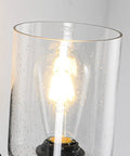 Close-up of seeded glass shade and bulb from Set Of 2 Black Farmhouse Vanity Wall Lights With Seeded Glass Shades Sleek Modern Metal Sconce Fixtures For Bathroom Bedroom Hallway Living Room Decor E26 Base Compatible 60W Max Easy Mount