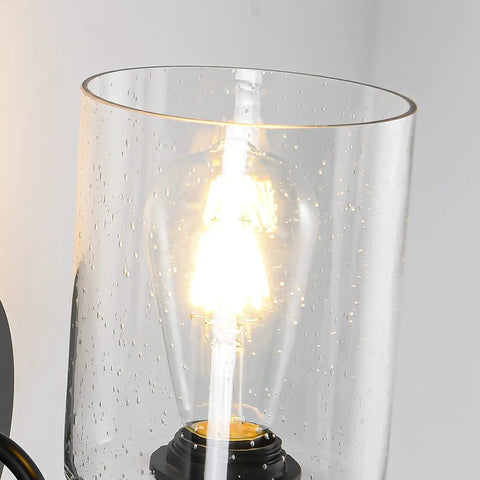 Close-up of seeded glass shade and bulb from Set Of 2 Black Farmhouse Vanity Wall Lights With Seeded Glass Shades Sleek Modern Metal Sconce Fixtures For Bathroom Bedroom Hallway Living Room Decor E26 Base Compatible 60W Max Easy Mount
