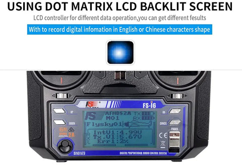Close-up of Six Channel 2.4GHz RC Transmitter With FS-iA6 Receiver, featuring dot matrix LCD backlit screen, digital display.