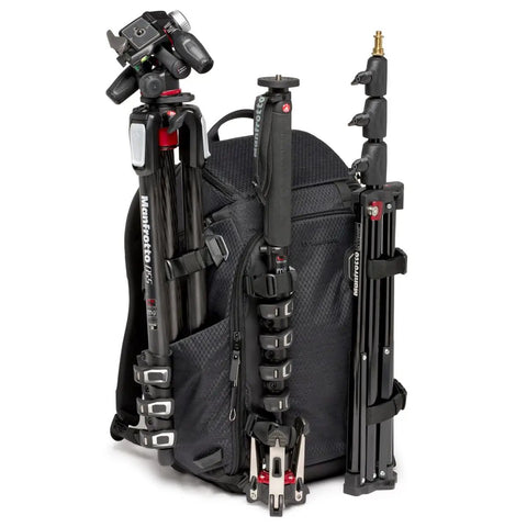 Pro Photo Backpack For Camera Gear Loadout With Four Access Points Front And Side Entry Triple Mode Interior Interchangeable Dividers Tripod Attachments Pro Grade Build M Guard Protection Black showcasing tripod attachments.