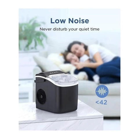 Portable Countertop Ice Maker With No Sweat Self Cleaning Generates Nine Gentle On Teeth Cubes In Just Six Minutes on a marble table.