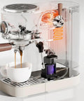 Close-up of Slick Dual Boiler Semi Automatic Espresso Machine With Built In Grinder And Cold Brew Function 20 Bar Pressure 2100 Watt Motor making espresso.