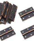 Top Shelf Copper Cabinet Hinges For Doors And Furniture With Complete Screw Set Smooth Glide Zero Hassle Kickass Build Quality Perfect Fit Every Time Pack Of Twelve showing heavy duty copper hinges stacked and laid out.