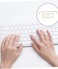 Premium Gold Plated Satellite Stabilizer Wires For Mechanical Keyboards shown with hands on a white keyboard for typing.