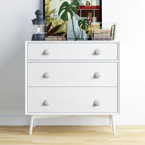 Ten Piece White Round Ceramic Drawer Knobs And Cabinet Pulls For A Quick Furniture Glow Up Featuring A Legit Glossy Grip And Super Chill Vibe To Make Your Cupboards Look Snazzy And Fresh on white dresser.