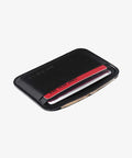DAKA Everyday Tactical Slim Minimalist Card Holder Wallet Ultra Pocket Friendly EDC Gear For Men And Women Durable Polymer Build Holds Cards IDs And Some Cash Travel Ready In Black showing cards inserted