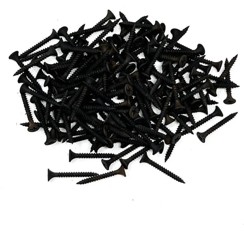 Pro Grade Drywall Screws For Light Gauge Steel Studs Size Six By One And A Quarter Inch Bugle Head Fasteners in a pile on white background.