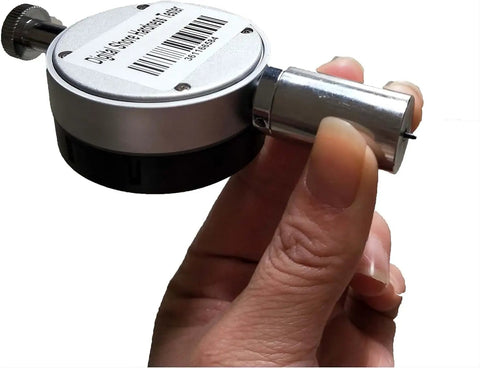 Heavy Lifter Manual Durometer Stand With Digital Shore Hardness Tester for precise rubber testing, held in hand.