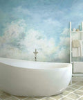 Blue In The Clouds Peel And Stick Wall Mural 10.5 Ft by 6 Ft easy to install in bathroom with bathtub and towel rack