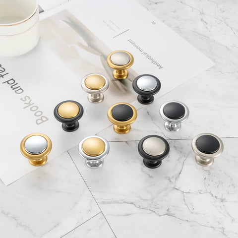 Round Cabinet Knobs 10 Pack Matte Black And Nickel displayed on a marble surface, showcasing solid metal construction and design variety.