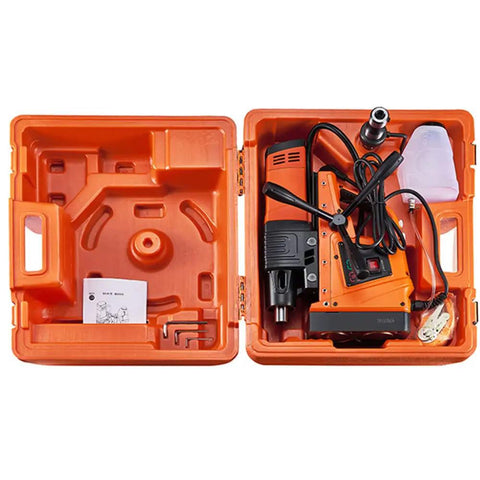 Heavy Duty Magnetic Drill Press Featuring A Powerful 1500W Motor and Super Tight Grip in an orange case, with tools and accessories visible.