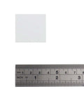 30 Pieces 1.38 Inch Finger Pulls Aluminum Alloy White Cabinet Drawer Hardware With 0.63 Inch Hole Centers next to a ruler for scale