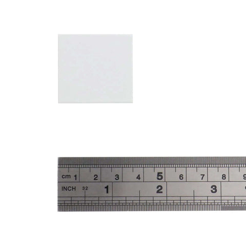 30 Pieces 1.38 Inch Finger Pulls Aluminum Alloy White Cabinet Drawer Hardware With 0.63 Inch Hole Centers next to a ruler for scale